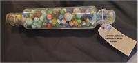 old glass rolling pin + appx 180 old marbles