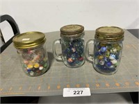 3 jars of vintage marbles