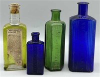Vintage Healing Oil and Poison Bottles