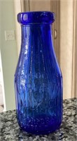 7" Blue glass milk bottle
