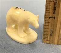 1 1/2" x 2" carved ivory polar bear mounted on a p