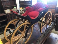 WOODEN CARRIAGE WITH RED LINING