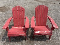 2 red fold up Adirondack style chairs