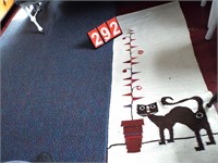 cat rug & blue area rug