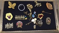 Tray of vintage costume brooches and pins.   1937