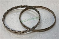 Lot includes two very nice sterling silver bangle
