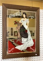 Vintage mirrored Coca-Cola advertisement with