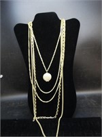 Dazzling 5-Chain Graduated Lengths Locket Necklace