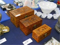 THREE NESTING CARVED WOOD BOXES - LARGEST IS