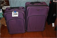 (2) Purple Suitcases