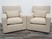 Pair of A. Rudin swivel occasional arm chairs