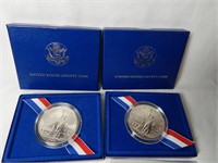 (2) 1986 Liberty 90% Silver Dollars Ellis Island