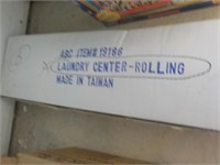 Laundry center rolling