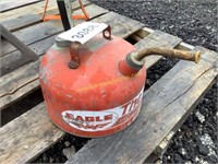 C4. metal gas can (red)