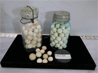 Porcelain Marbles in Three Jars of Assorted Sizes