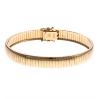A Lady's 14K Gold Flexible Bangle Bracelet