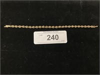 14K Gold Circular Link Bracelet.
