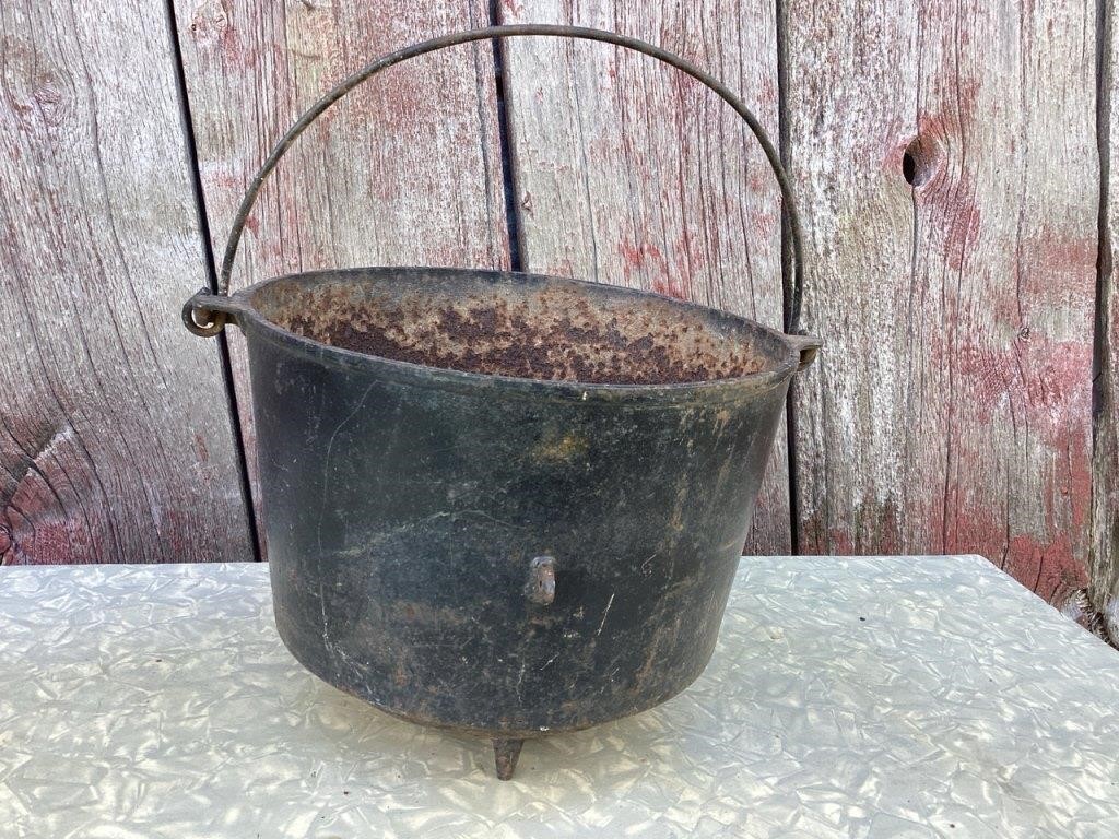 Large footed cast iron pot