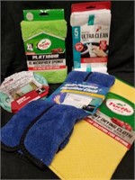 Group of new car cleaning accessories with a mint