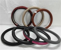 NEW STEERING WHEEL COVERS - QTY 7