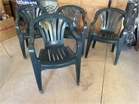 4 Stackable plastic lawn chairs