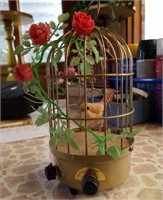 Singing bird in cage, 9" tall,  9 volt battery