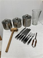 Canisters. Utensils. Tenderizer. Glass measurer