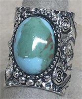 Silver ring marked .925, size 8 turquoise set