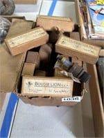 Vintage spark plugs in boxes
