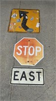 Three Metal Road Signs