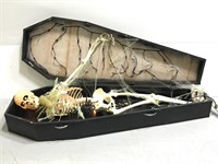 Skeleton in coffin Halloween decor prop