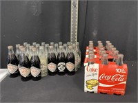Lot of Coca Cola Commerative Anniversary Bottles