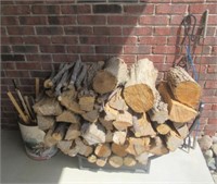Wood rack with misc. fire tools.