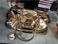 BetseyVille Gold Rolling Luggage Duffle Bag