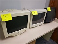 3 computer monitors