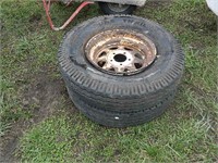 2 TIRES AND RIMS 7.00X15 LT 5 LUG 2X BID