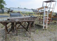 4 steel saw horses and 2 storage shelves