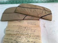 WWII Army hats with letter from child tucked in it