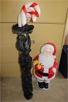 candy canes & lighted plastic santa claus