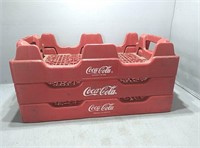 3 stackable Coca-Cola crates