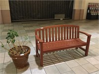 Red Round Back Bench with Flower Pot