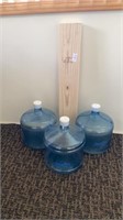 Three 3 gallon water containers and 32 “ long 1