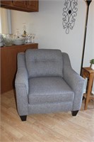Upholstered armchair with removable seat