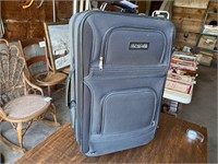 CARRY ON ROLLING SUITCASE