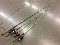 3 fishing rods with reels.