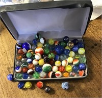 Marbles in tin