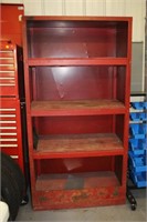 Metal shelving unit with plywood shelves,