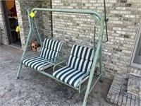 Porch swing with cushions