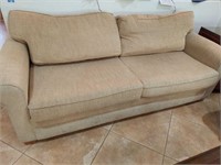 Beige Couch with pullout bed