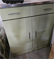 Small metal cabinet. Green